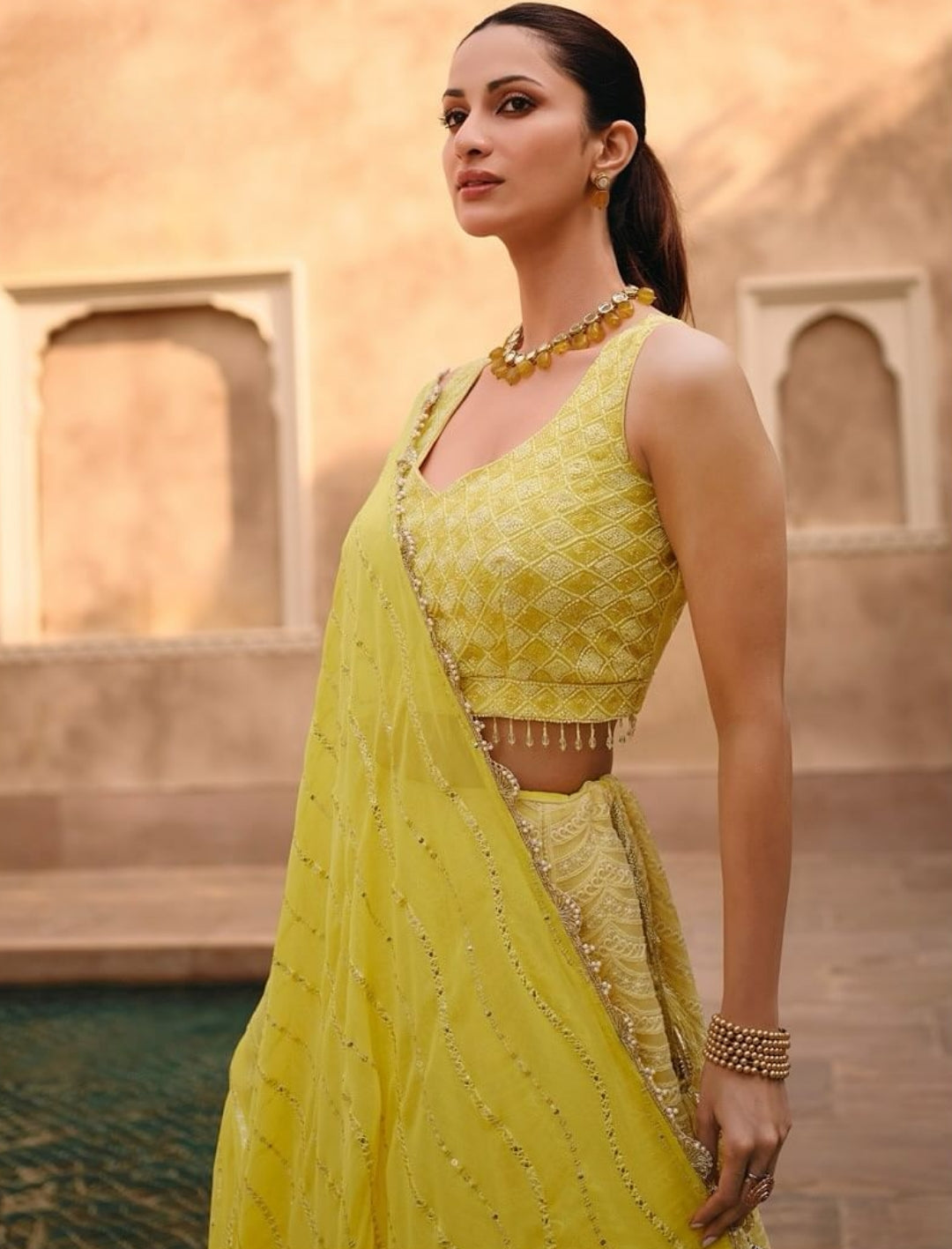 Radiant Yellow Embroidered Real Georgette Lehenga Choli