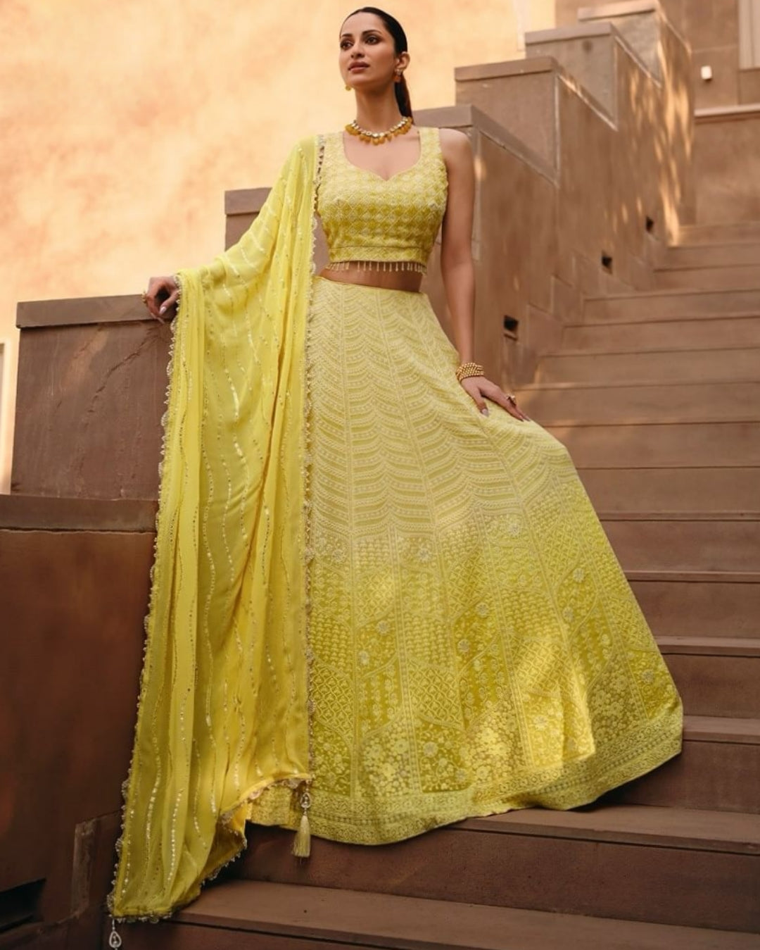 Radiant Yellow Embroidered Real Georgette Lehenga Choli