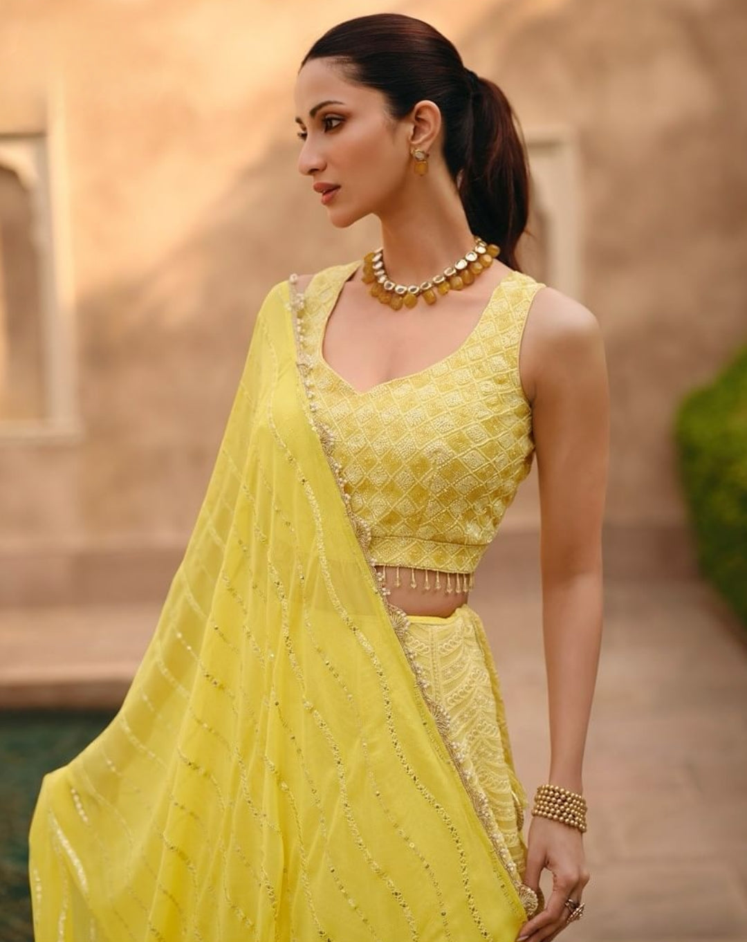 Radiant Yellow Embroidered Real Georgette Lehenga Choli