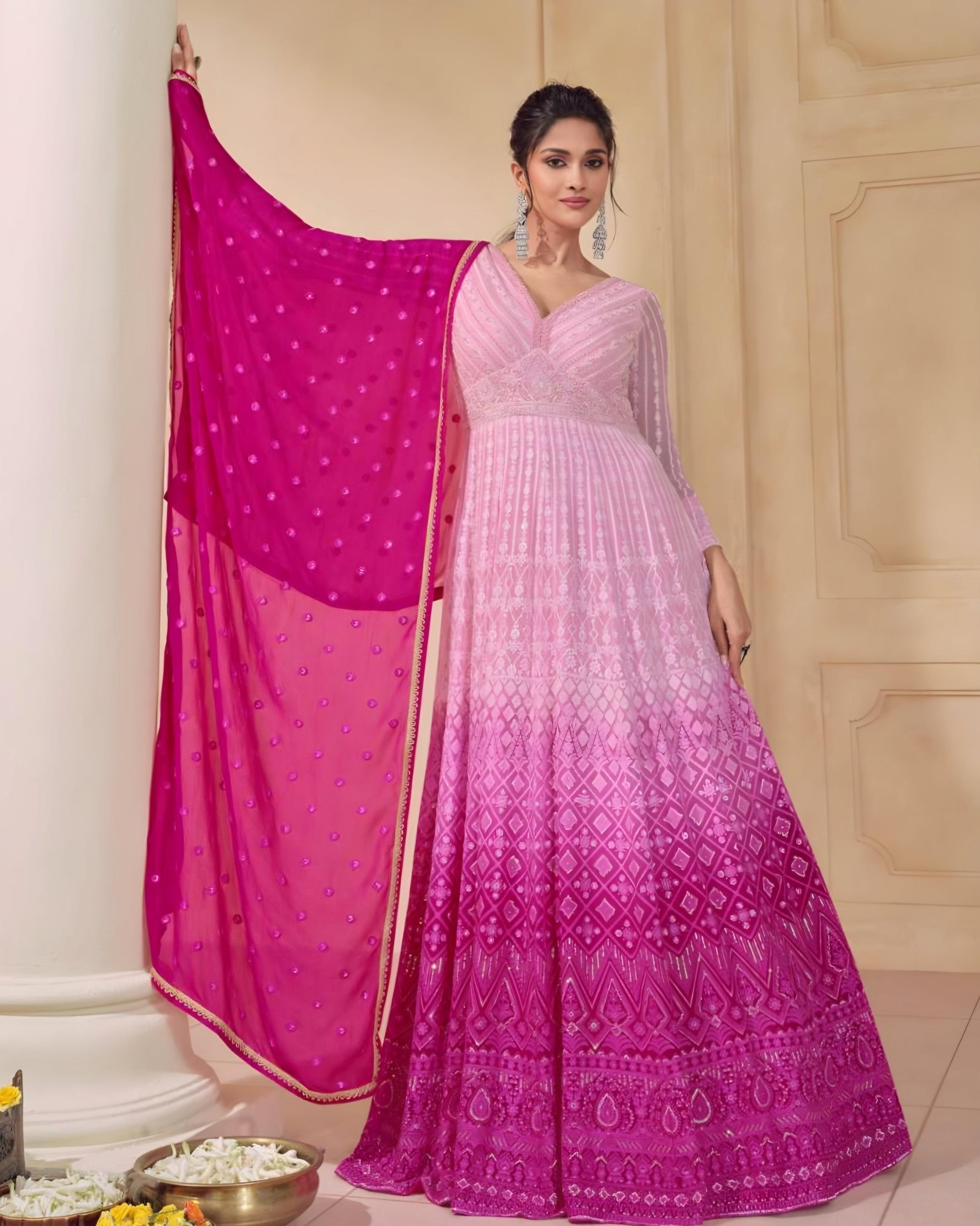 Pink ombre Anarkali gown with delicate embroidery, sheer sleeves, and matching pink dupatta, ideal for weddings, festivals, and special events, available at Sakhi Fashions